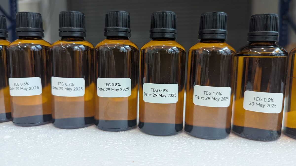 Sample bottles from Test Run 1, 29 May 2025: TEG samples at 0.6% through 1.0% water content